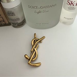 YSL Saint Laurent Gold Tone Logo Brooch